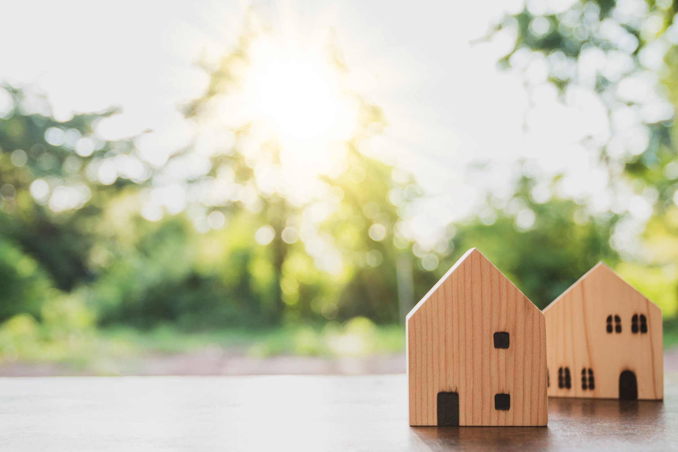 Dream House Concept Wooden House Model on Nature Background